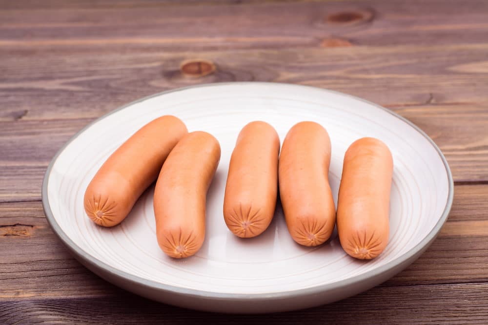 como hacer salchichas de pollo